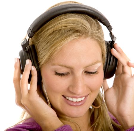 girl listening to music looking happy isolated over white