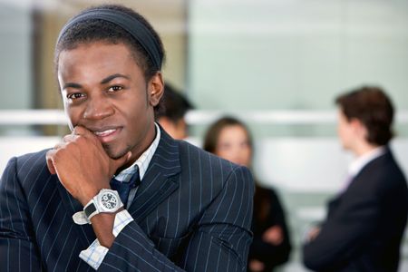 black business man standing at an office