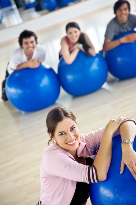 group of people at the gym smiling