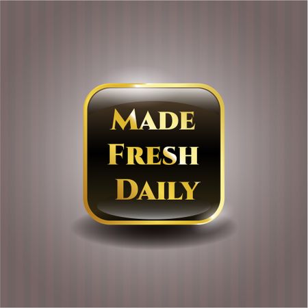 Made fresh daily gold emblem