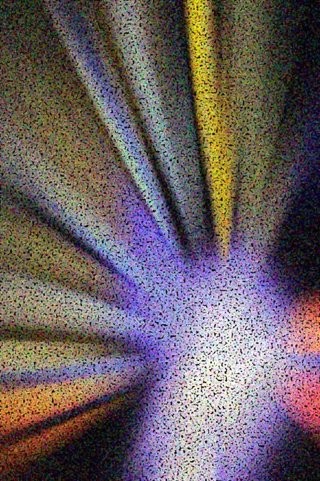 Pointillist abstract of multicolored radial blur for themes of radiation, cosmological origin, or stellar phenomena