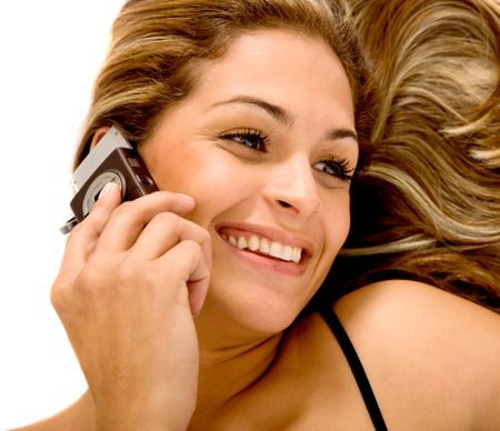 Beautiful woman on the phone isolated