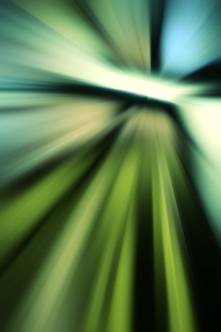 Abstract radial blur with predominance of green for futuristic themes of lightspeed travel or otherworldly phenomena