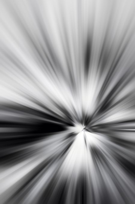 Abstract radial blur in black and white for themes of emanation, mystery, or convergence in decoration or background