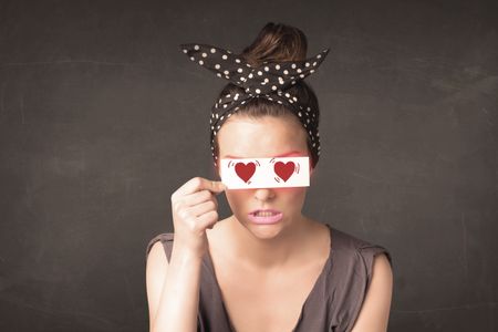pretty-girl-holding-paper-red-heart-278625566 Pretty girl holding paper with red heart drawing concept