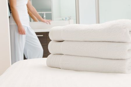 Towels on the bed.