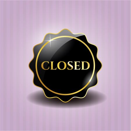 Closed black badge with pink background
