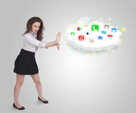 Young woman presenting cloud with colorful app icons and symbols concept