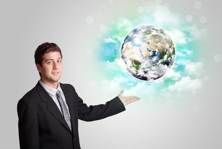 Young business man with earth and cloud concept
