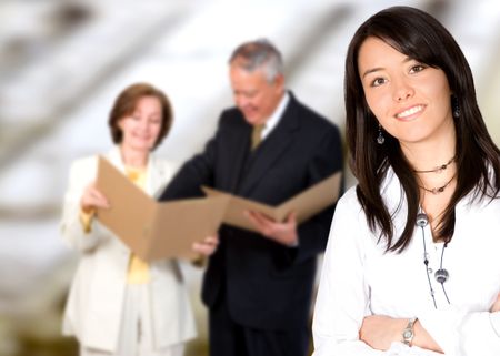 business team work in an office environment - business woman at the front