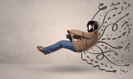 Funny man driving a flying vehicle with hand drawn lines after him concept