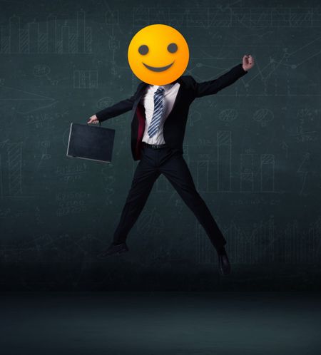 funny-businessman-wears-yellow-smiley-face-282633530 Funny businessman wears yellow smiley face