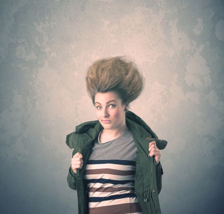 Extreme hair style young woman portrait on vintage background