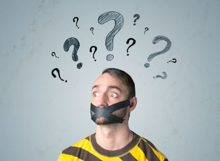 Young man with taped mouth and question mark symbols around his head