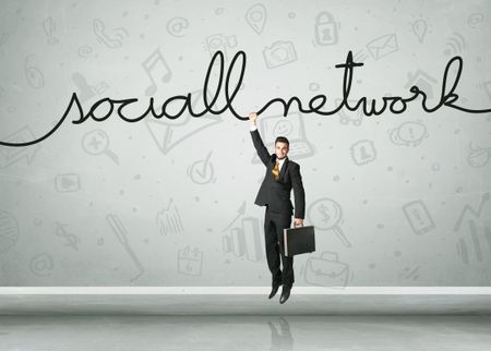 Businessman hanging on a social network rope
