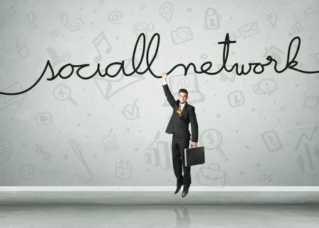 Businessman hanging on a social network rope