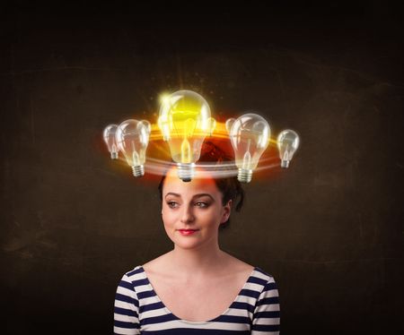 Preety woman with light bulbs circleing around her head 