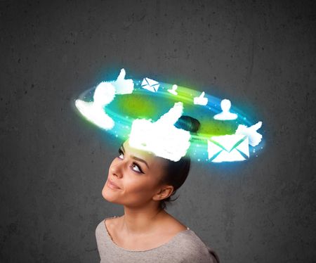 Teenager with cloud social icons around her head