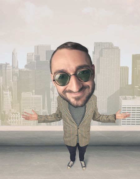 Funny guy with big head, cityscape background