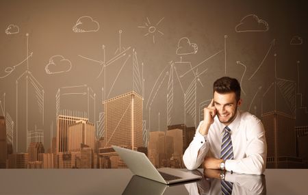 Businessman sitting at the black table with buildings and measurements on the background
