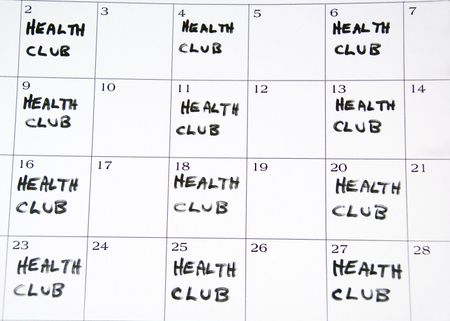 HEALTH CLUB written on alternate days on white monthly calendar