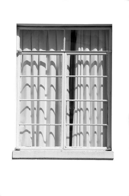 Exterior window, shadowed drapes open a crack, in strong sunlight, monochrome, isolated on white background