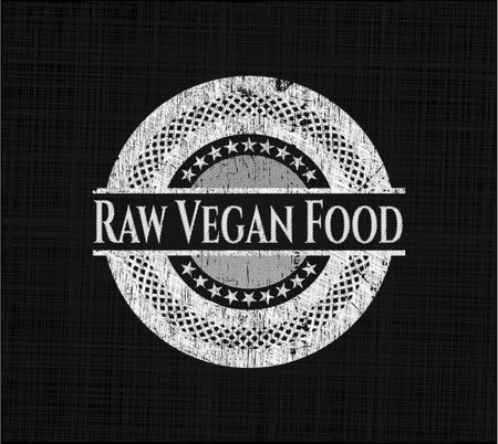 Raw Vegan Food chalkboard emblem written on a blackboard