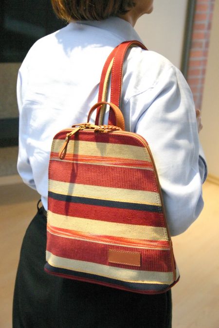 woman carrying a bag