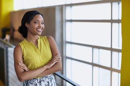 Portrait of a confident businesswoman at work in herglass office