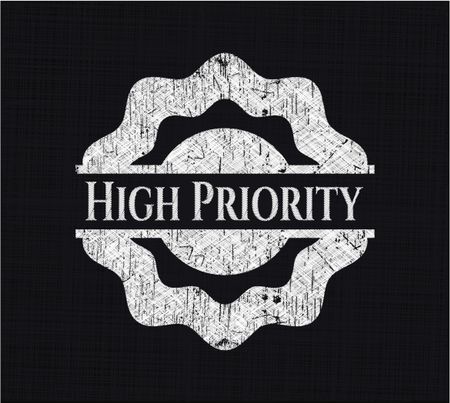 High Priority chalk emblem written on a blackboard