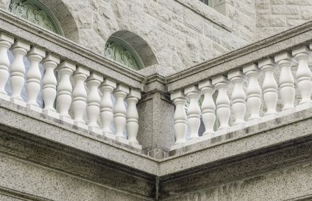 Balustrade of stone parapet on college campus
