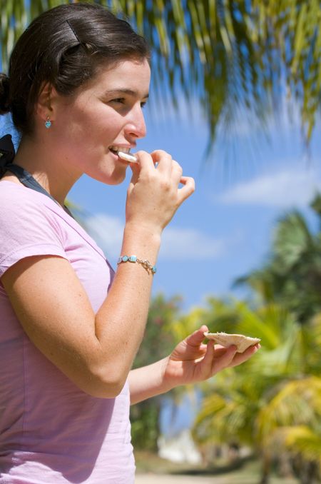 Eating coconut in a tropical location.