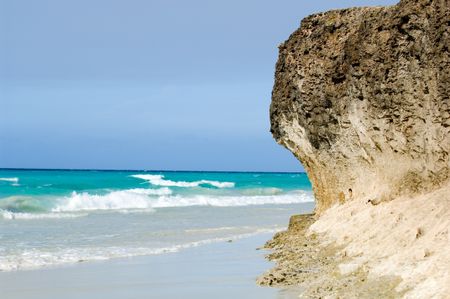 Scenic shot of a cliff by the ocean.