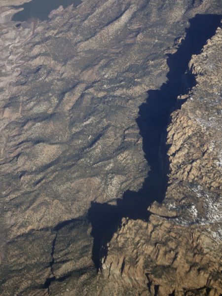 Aerial view of lower Rocky Mountains from approximately 35,000 feet in late February