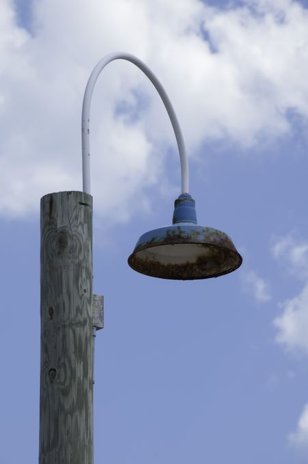 Rusting street light in Floridian beach town