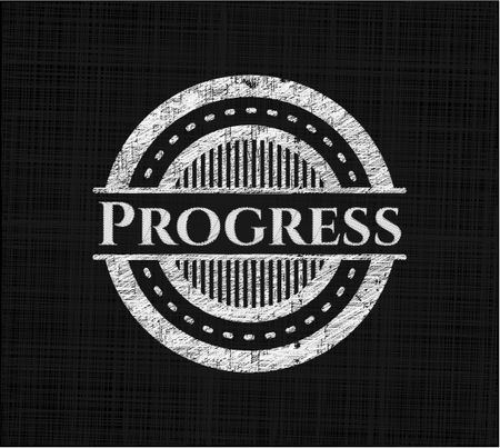 Progress chalkboard emblem written on a blackboard