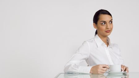 Thinking with a cup of coffee.