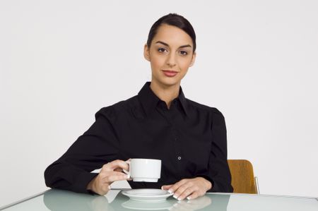 Businesswoman with a cup of coffee.