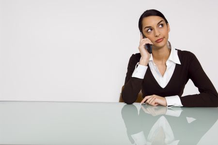Businesswoman talking on a cell phone.