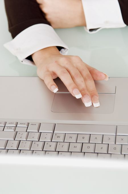 Detail of a woman using a laptop.