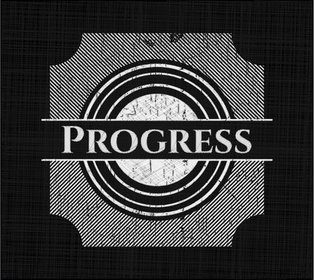 Progress chalkboard emblem on black board