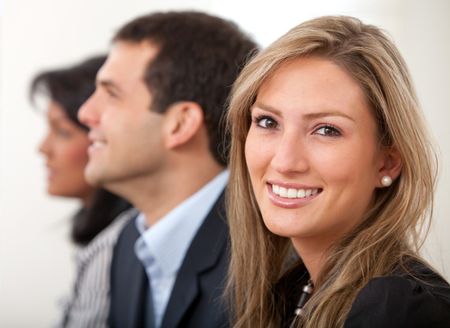 group of business people in an office lined up