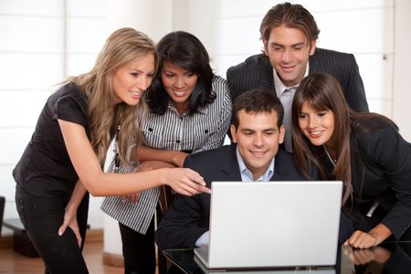 Business people on a laptop in an office