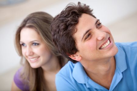 casual couple of young adults smiling