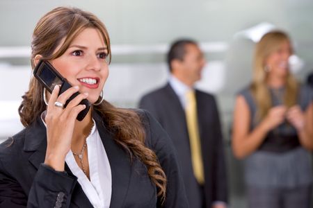 businesswoman talking on the phone in an office