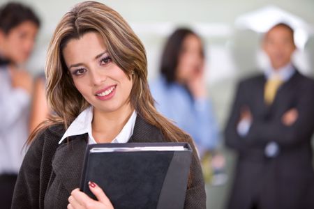 business woman portrait in an office smiling