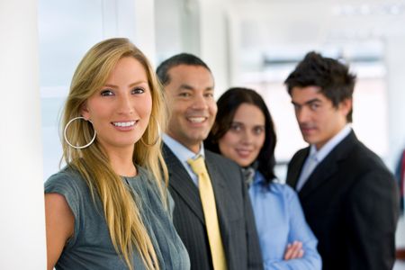 Smiley business team portrait at an office