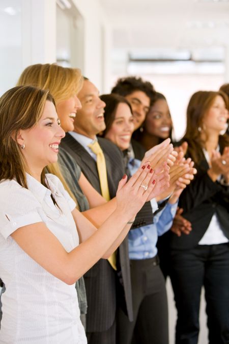 business team clapping a good presentation in an office