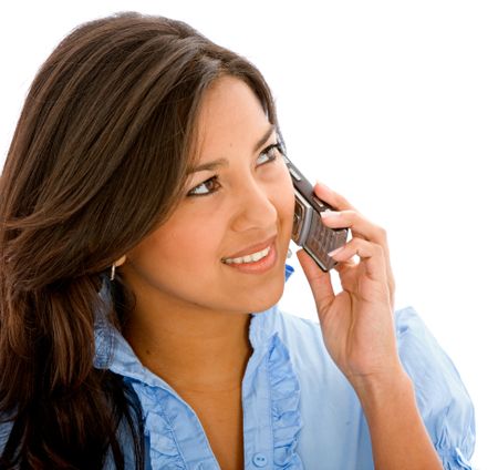 casual woman talking on her mobile phone - isolated