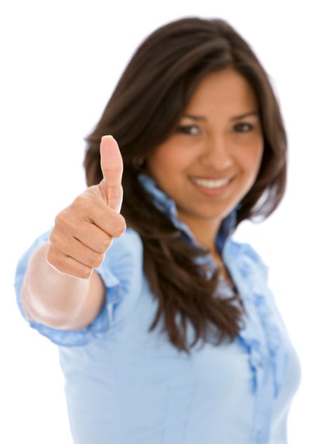 casual woman smiling with her thumbs up - isolated